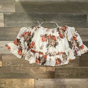 Floral and ivory blouse with shoulder revealed and flowy sleeves
